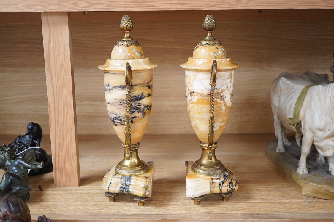 A pair of late 19th century French Sienna marble and ormolu mounted urns, 31cm high.